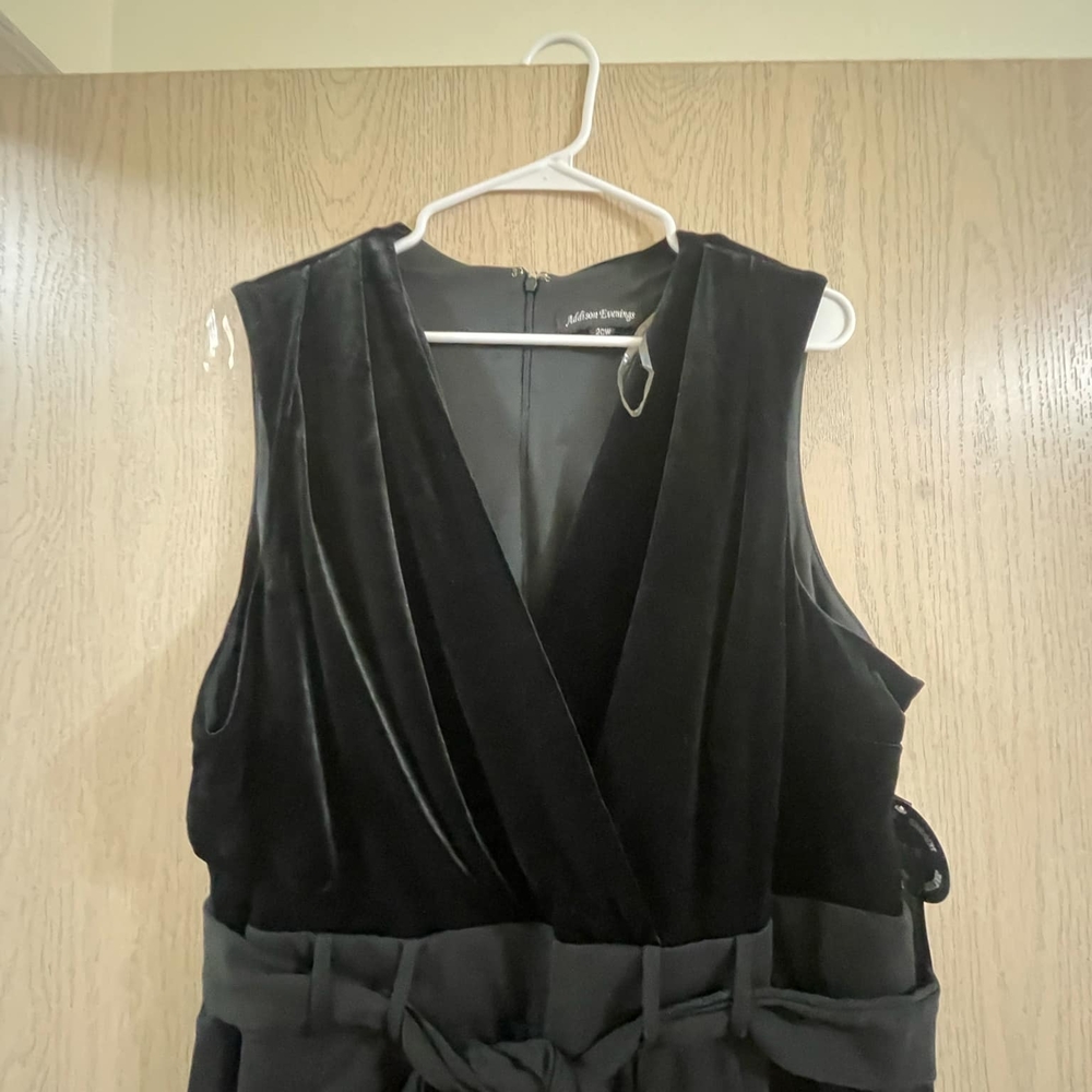 a new day Black Jumpsuit with Deep V-neckline and Wide Belt